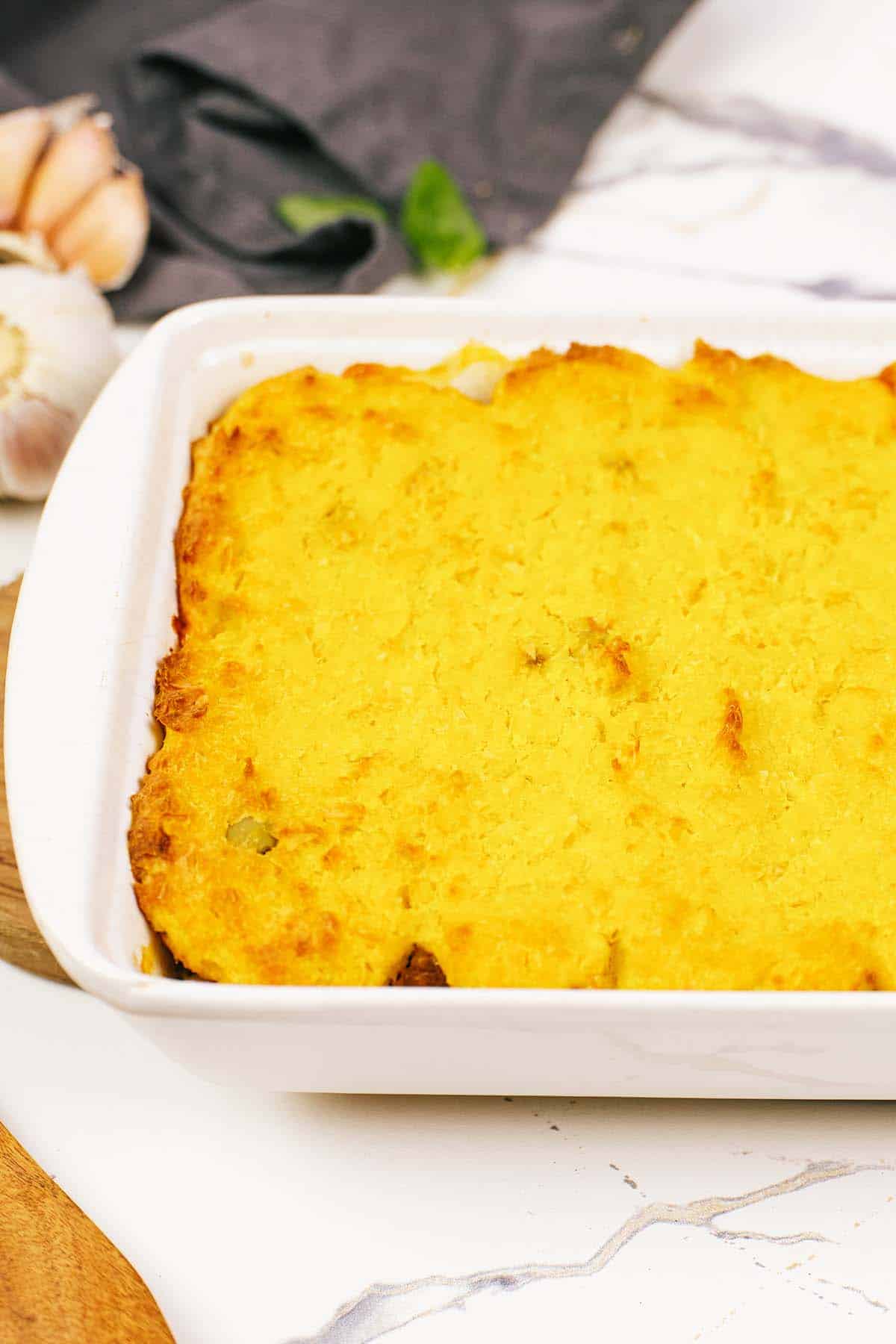 ready to serve pastel de chocolo corn and beef casserole in a baking dish