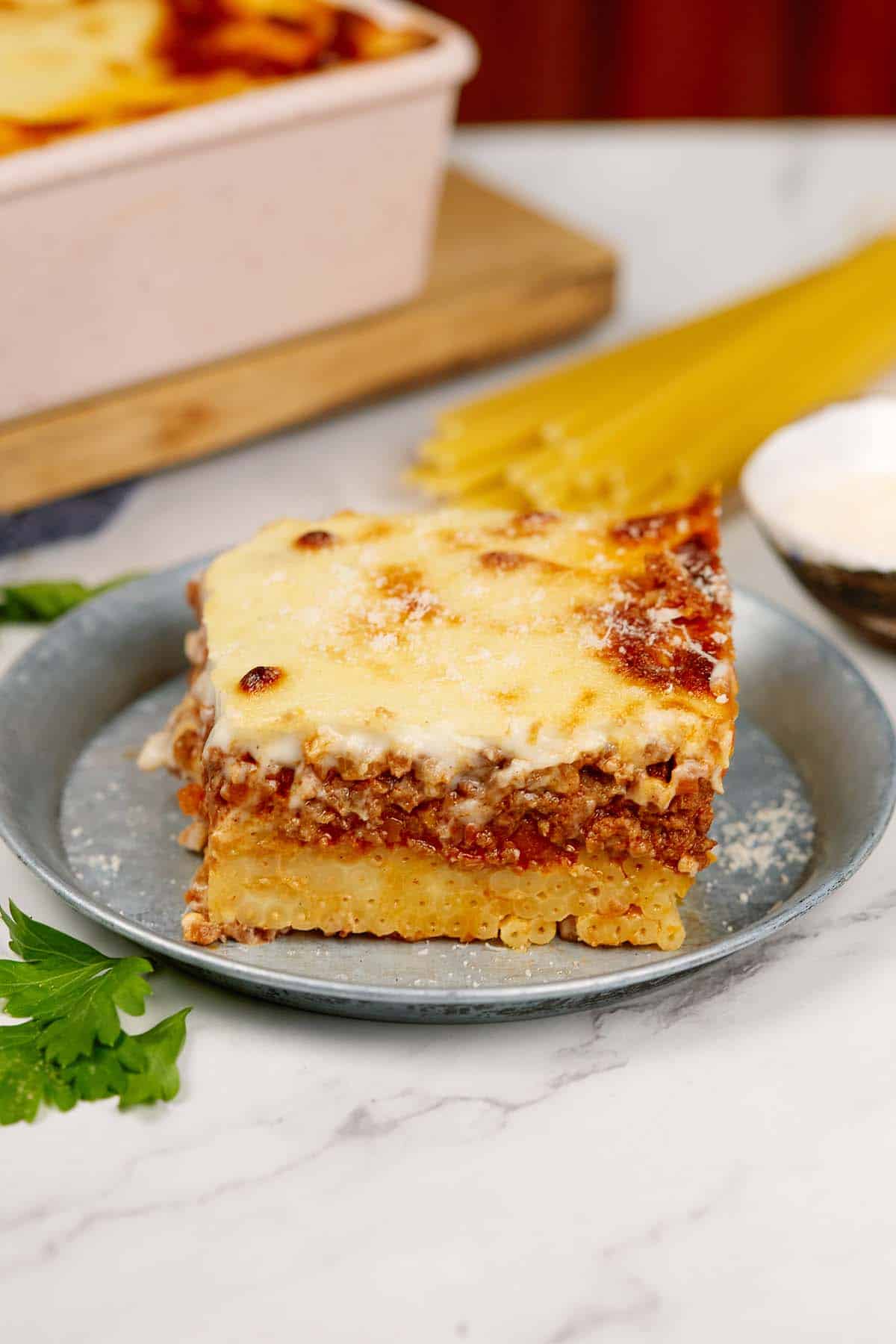 single serving of pastitsio greek beef pasta bake on a plate ready to enjoy