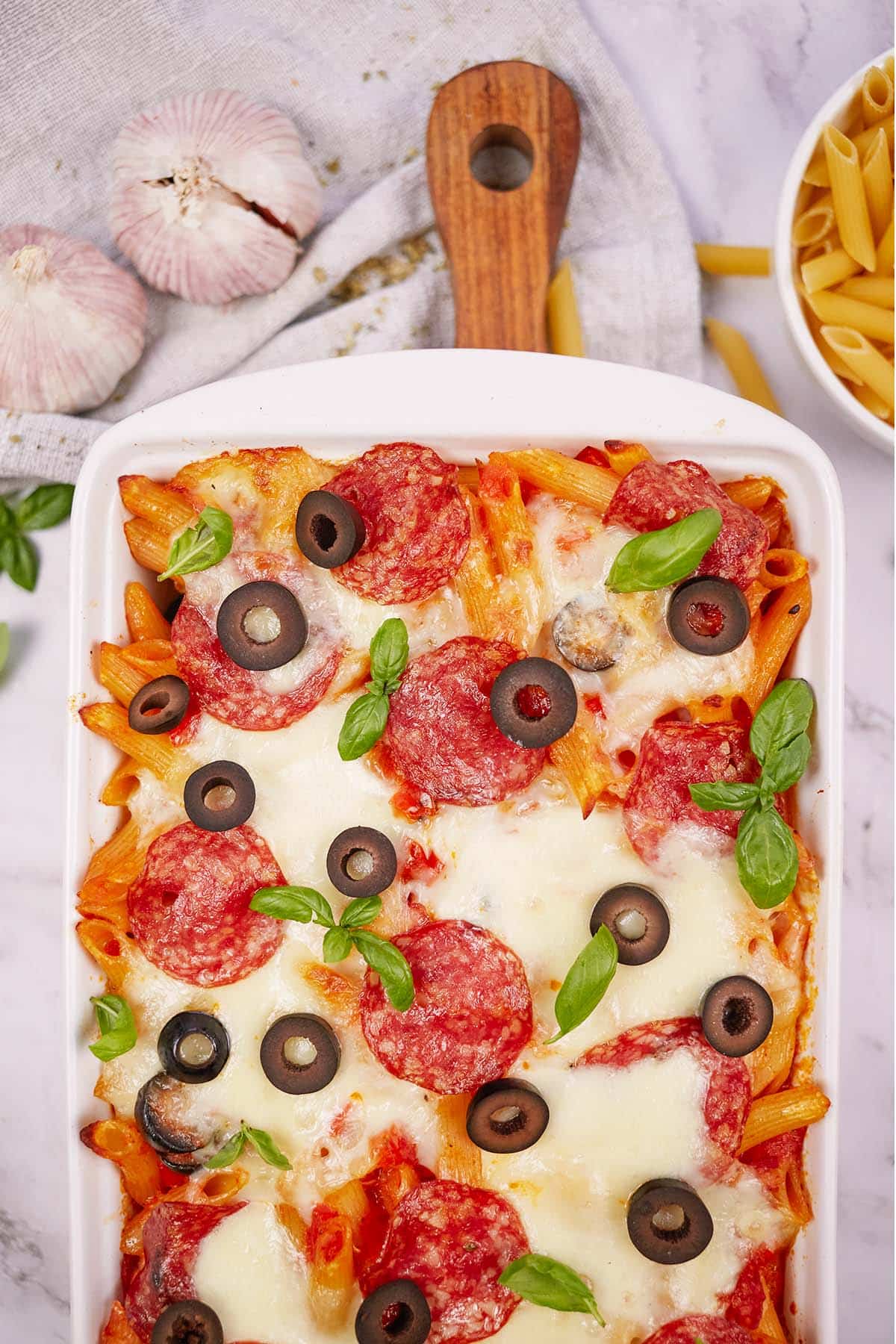 baking dish of pepperoni pasta bake fresh from the oven ready to serve