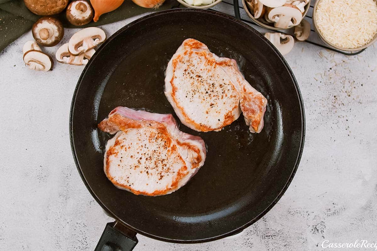 pan frying pork chops to make pork chops and rice casserole