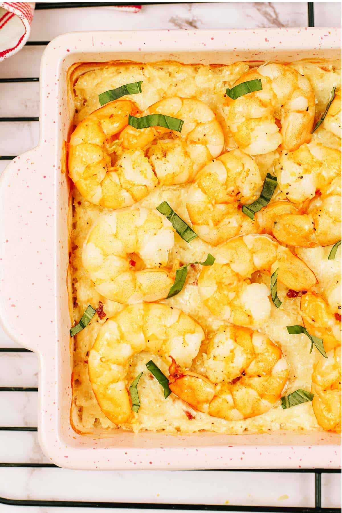 closeup of shrimp and cauliflower bake in a casserole dish