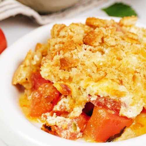 closeup of a bowl full of tomato casserole