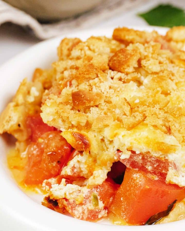 closeup of a bowl full of tomato casserole