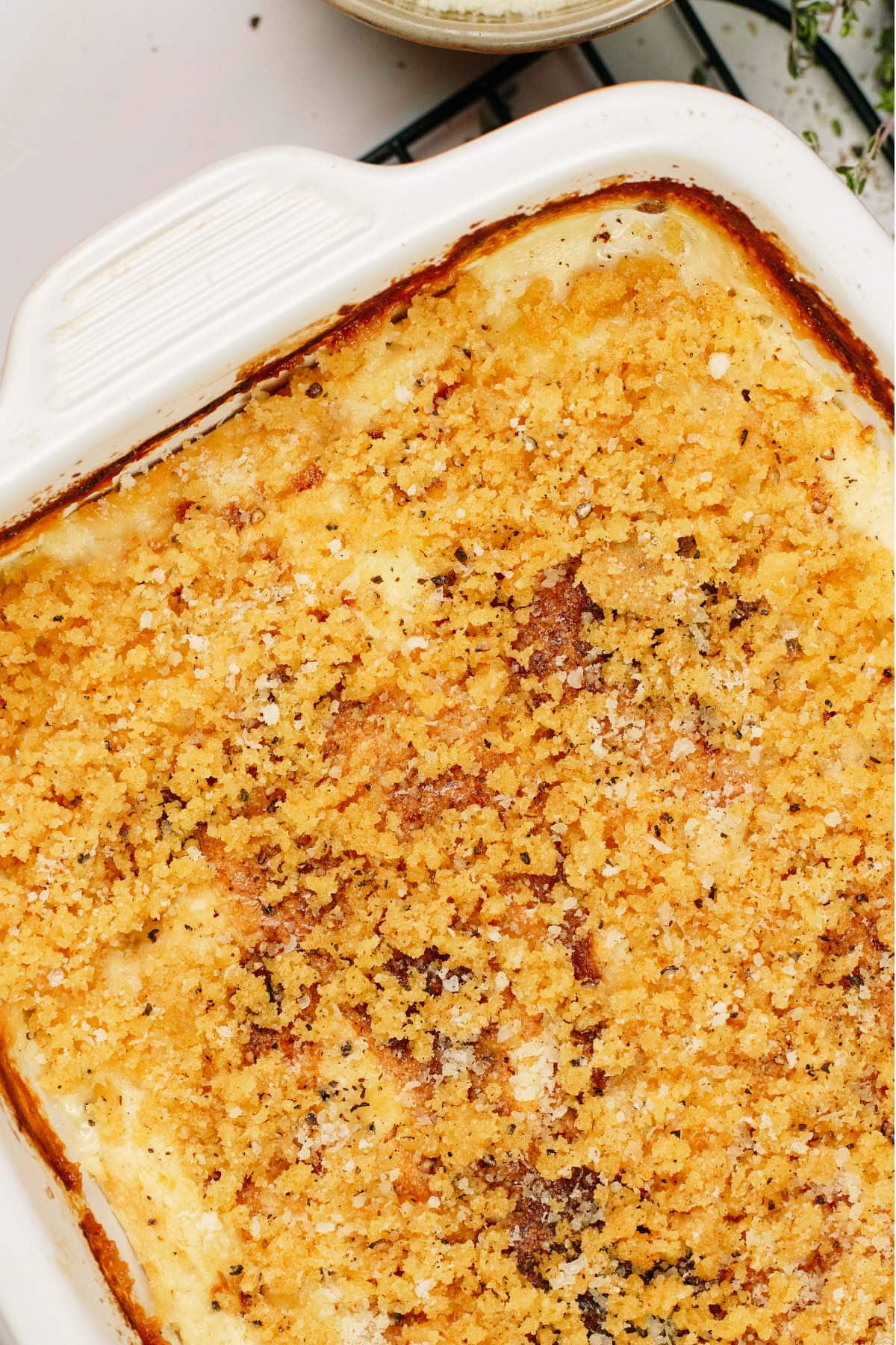 closeup of Cacio e Pepe Casserole in a baking dish