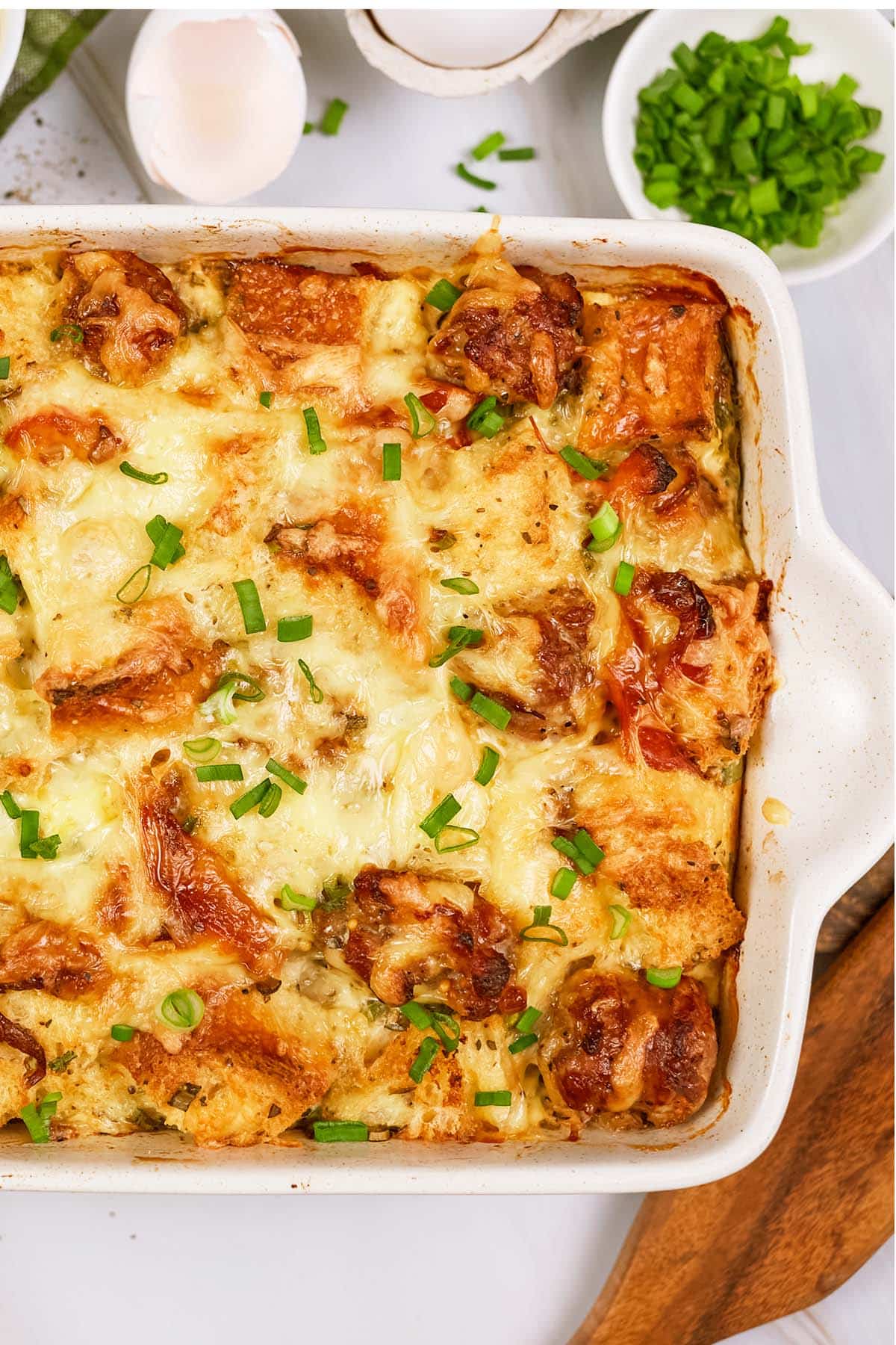 casserole dish of Cheesy Sausage Breakfast Casserole ready to serve