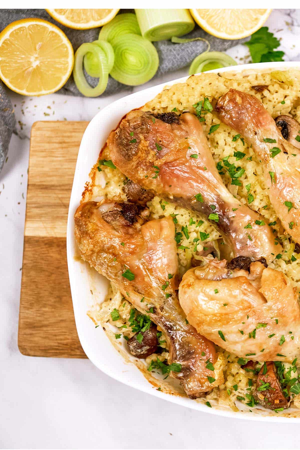 casserole dish of Chicken and Rosini Bake on a table with other ingredients