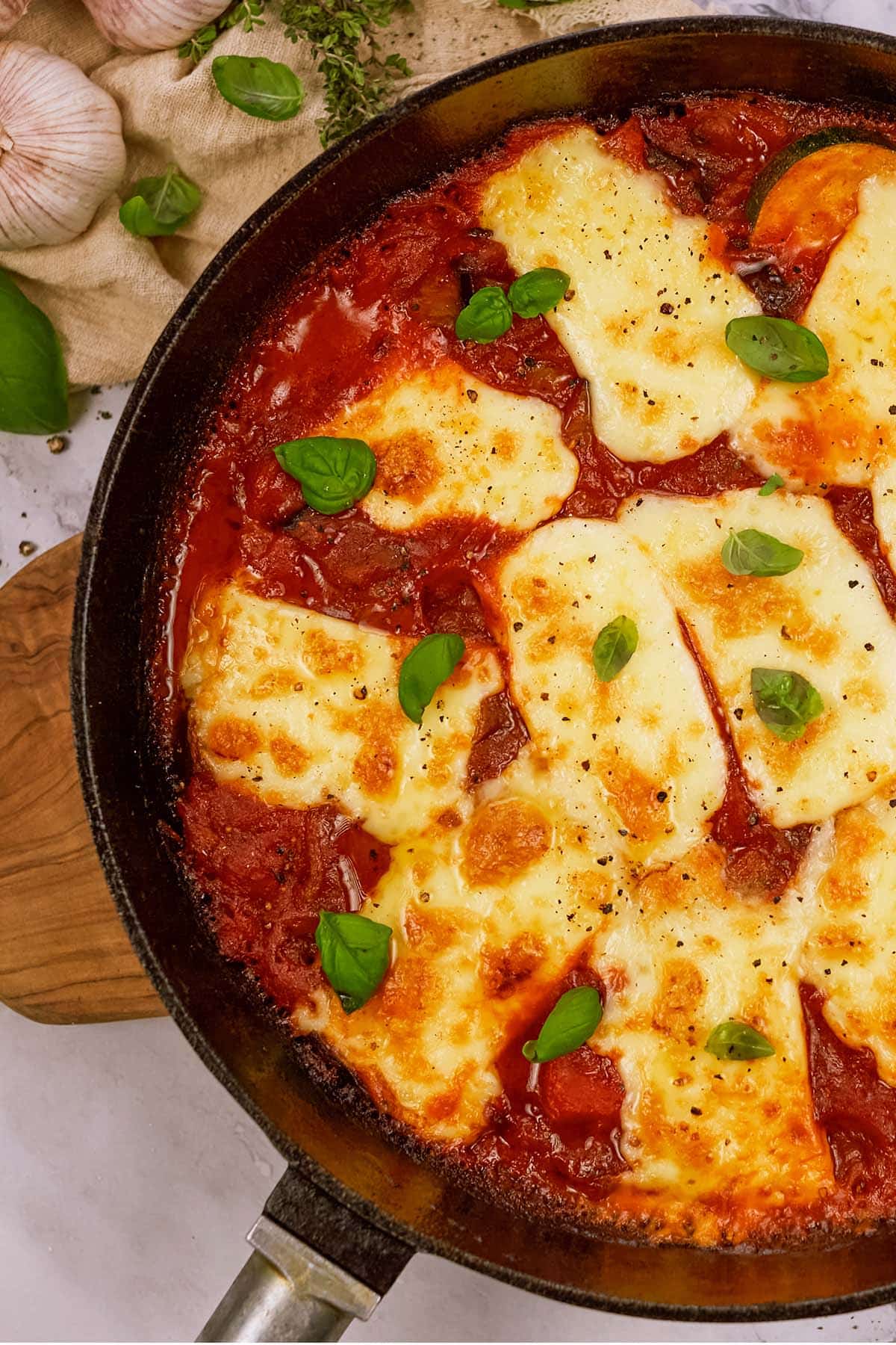 casserole dish of Tomato and Houllimi Bake on a table