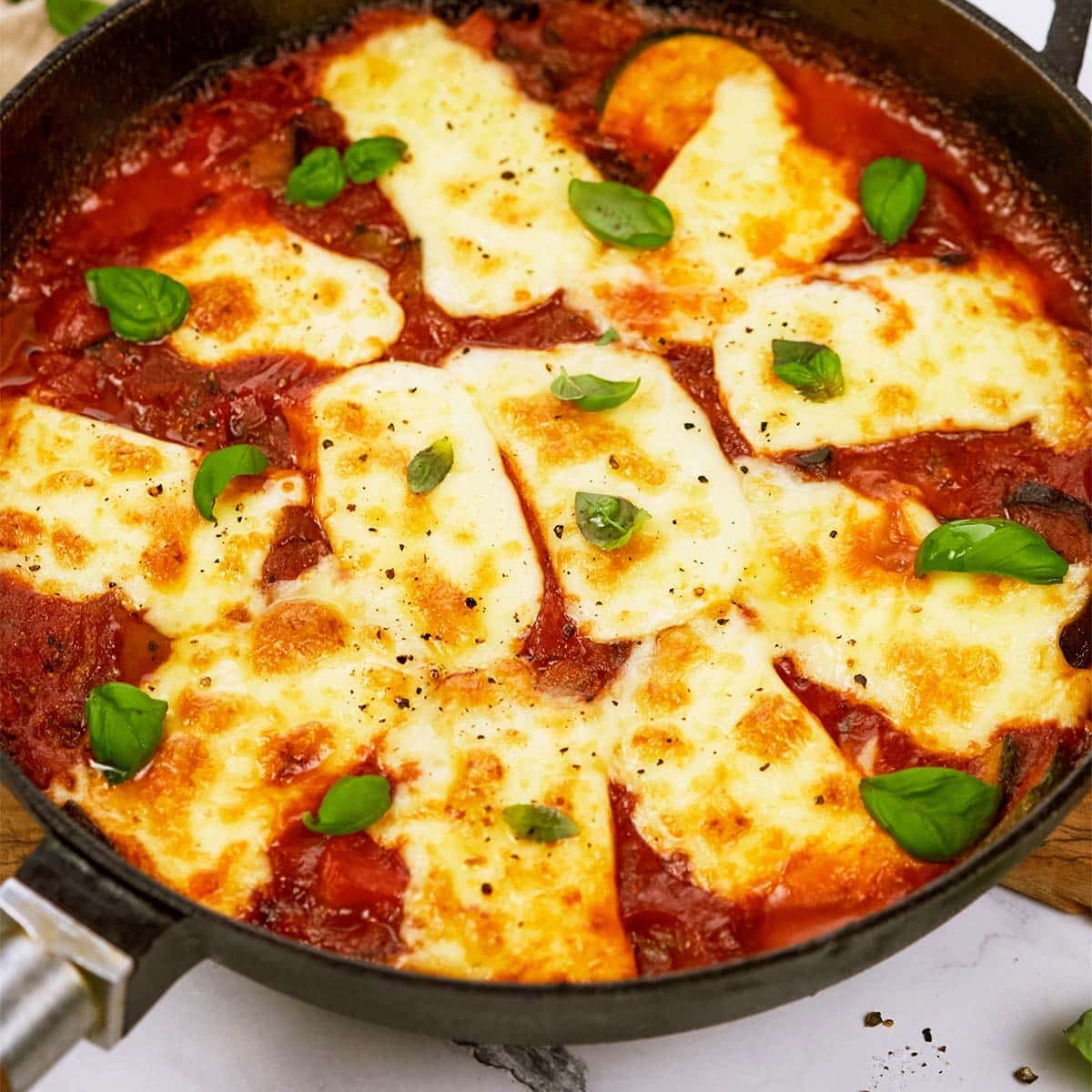 casserole dish filled with Tomato and Houllimi Bake