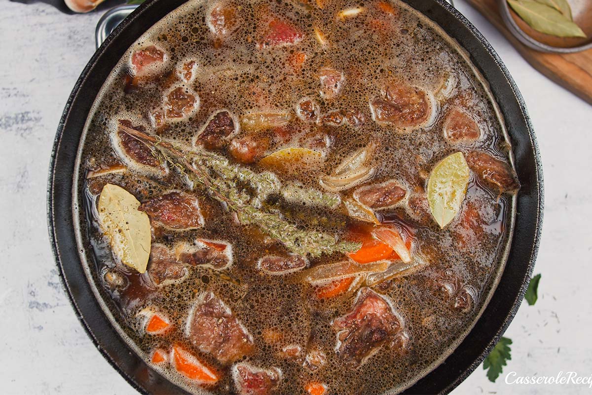 final step of making the best beef casserole recipe before baking