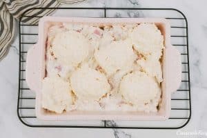 final step of making chicken cordon bleu bubble-up bake before baking it