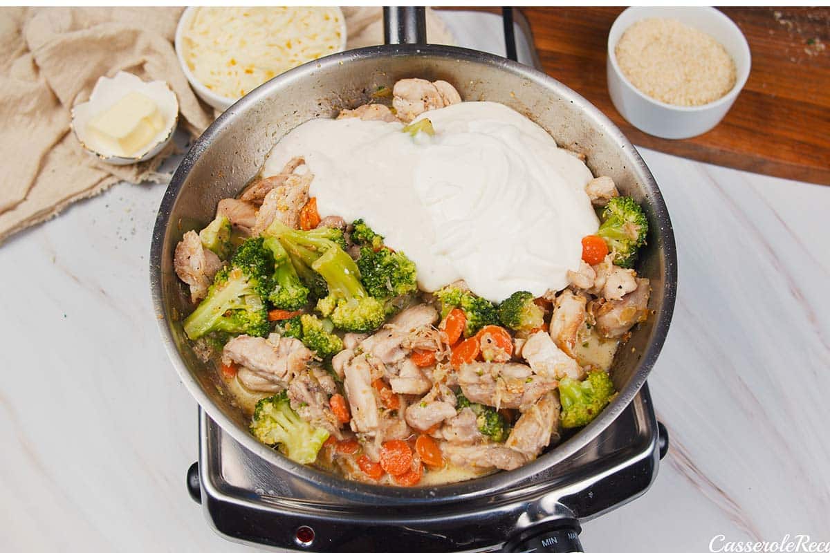 combining ingredients to make the filling for chicken divan