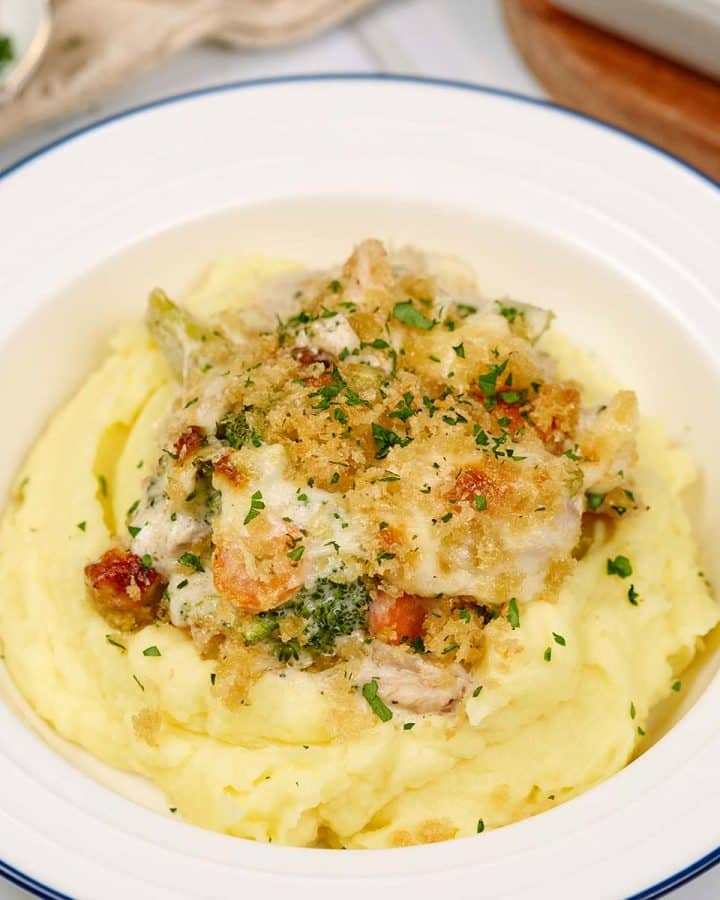 serving of chicken divan in a bowl on the table ready to enjoy