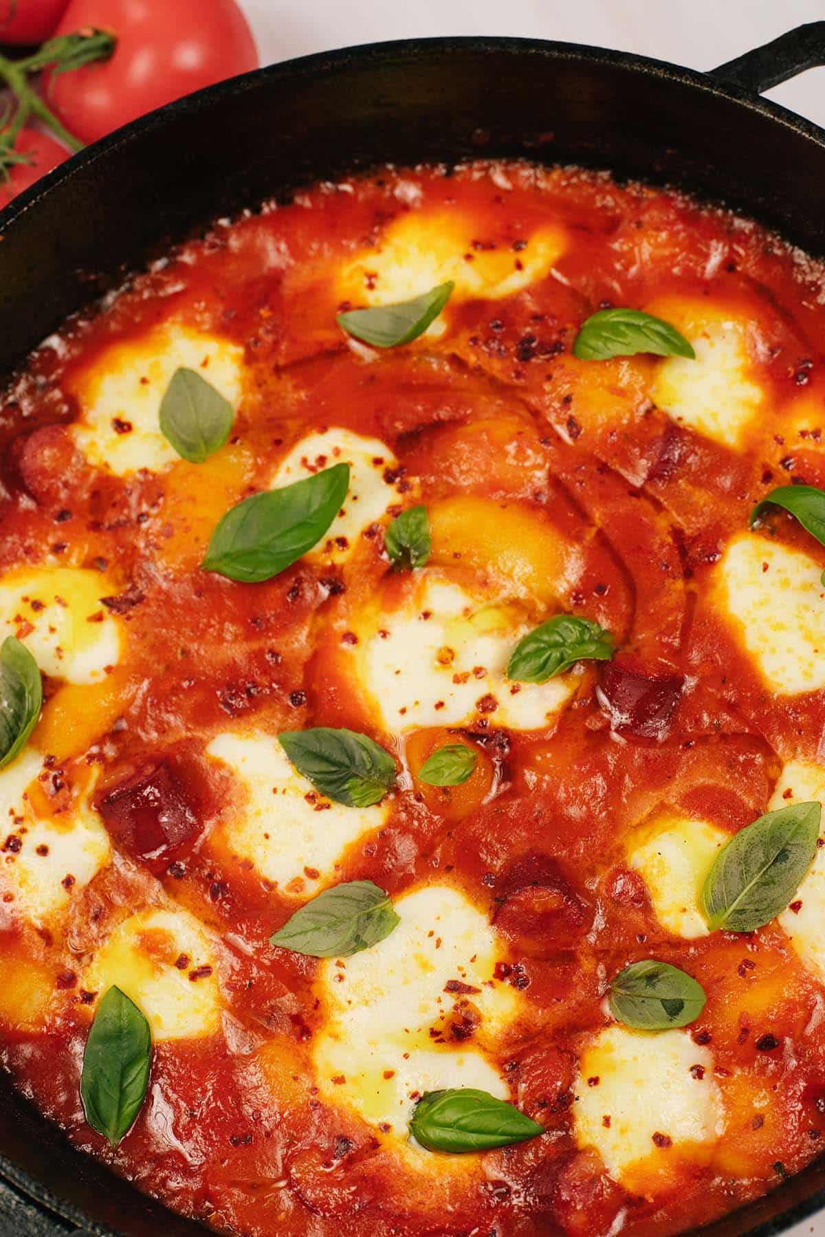 closeup of chorizo gnocchi bake in a casserole dish