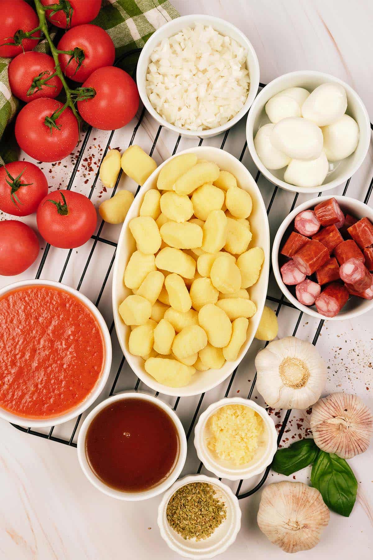 overhead view of ingredients to make chorizo gnocchi bake on a table