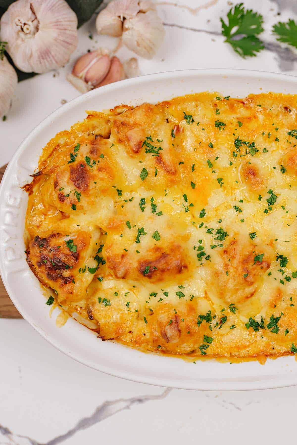 overhead view of a baking dish full of creamy cauliflower casserole