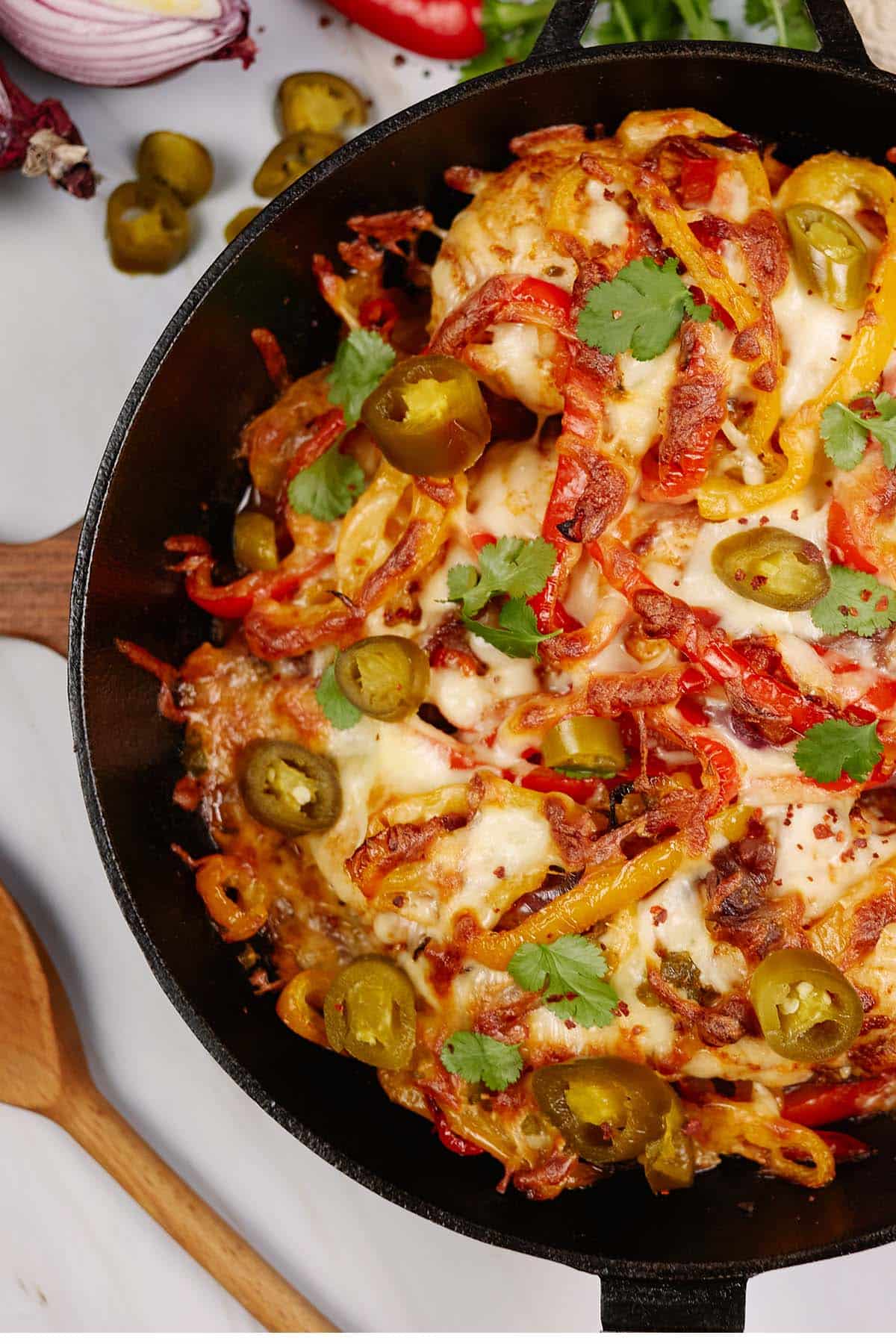 closeup of a casserole dish of fajita chicken bake on a table