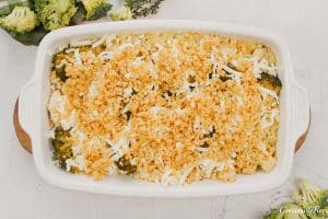 overhead view of a casserole dish of garlic cheddar chicken bake just prior to baking