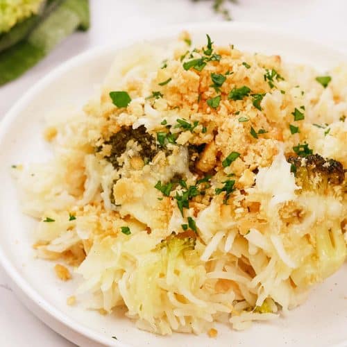 plate filled with a serving of garlic cheddar chicken bake on a table