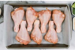 chicken legs being prepared to make miso chicken bake