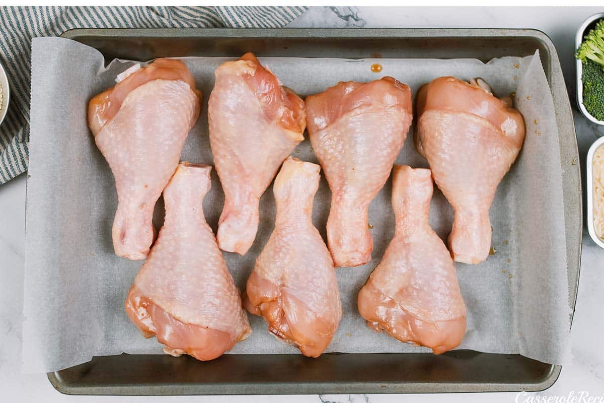 chicken legs being prepared to make miso chicken bake