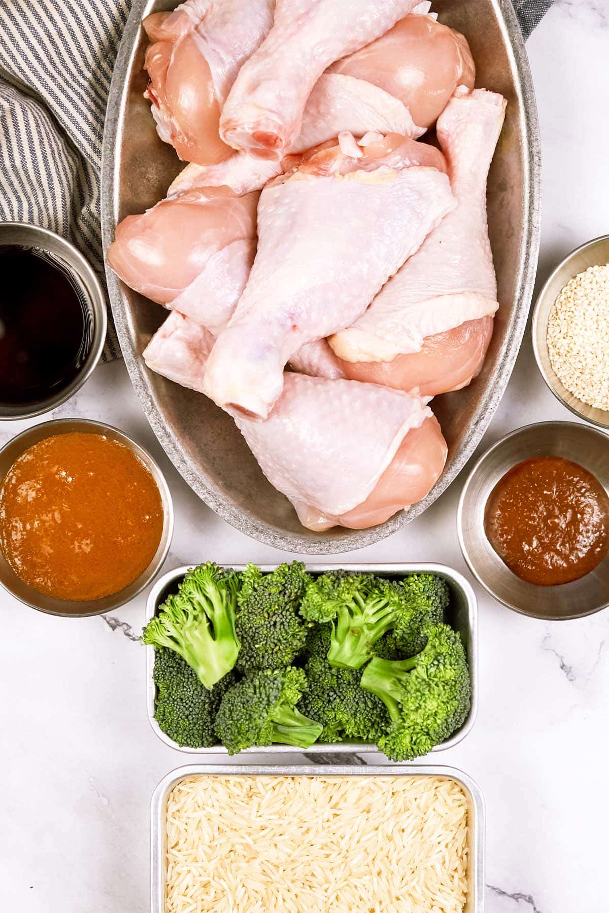 overhead view of the ingredients necessary to make miso chicken bake on a table