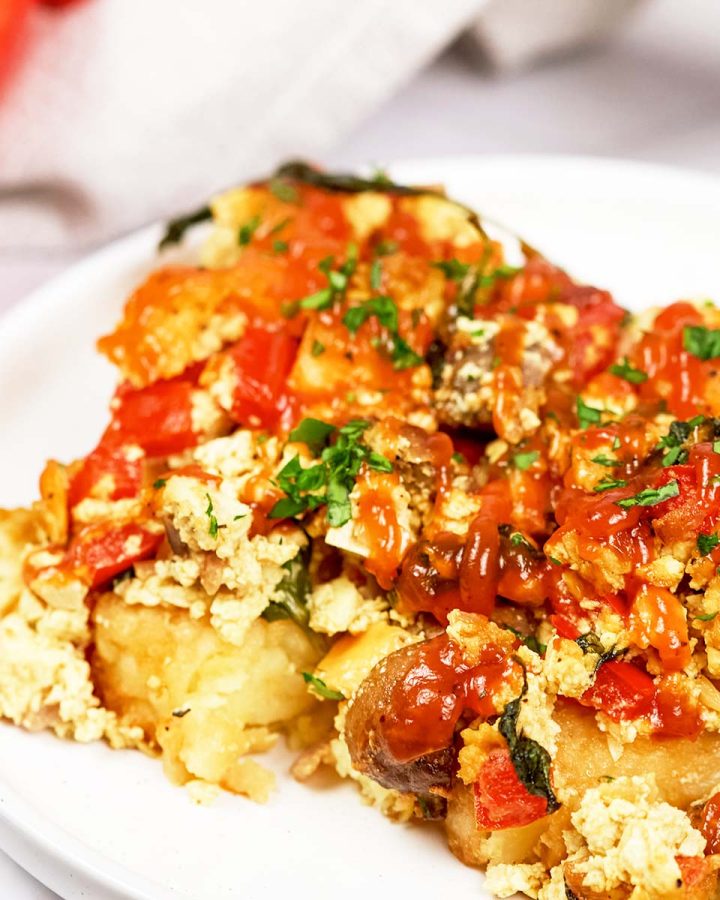 serving of scrambled tofu casserole on a plate ready to enjoy