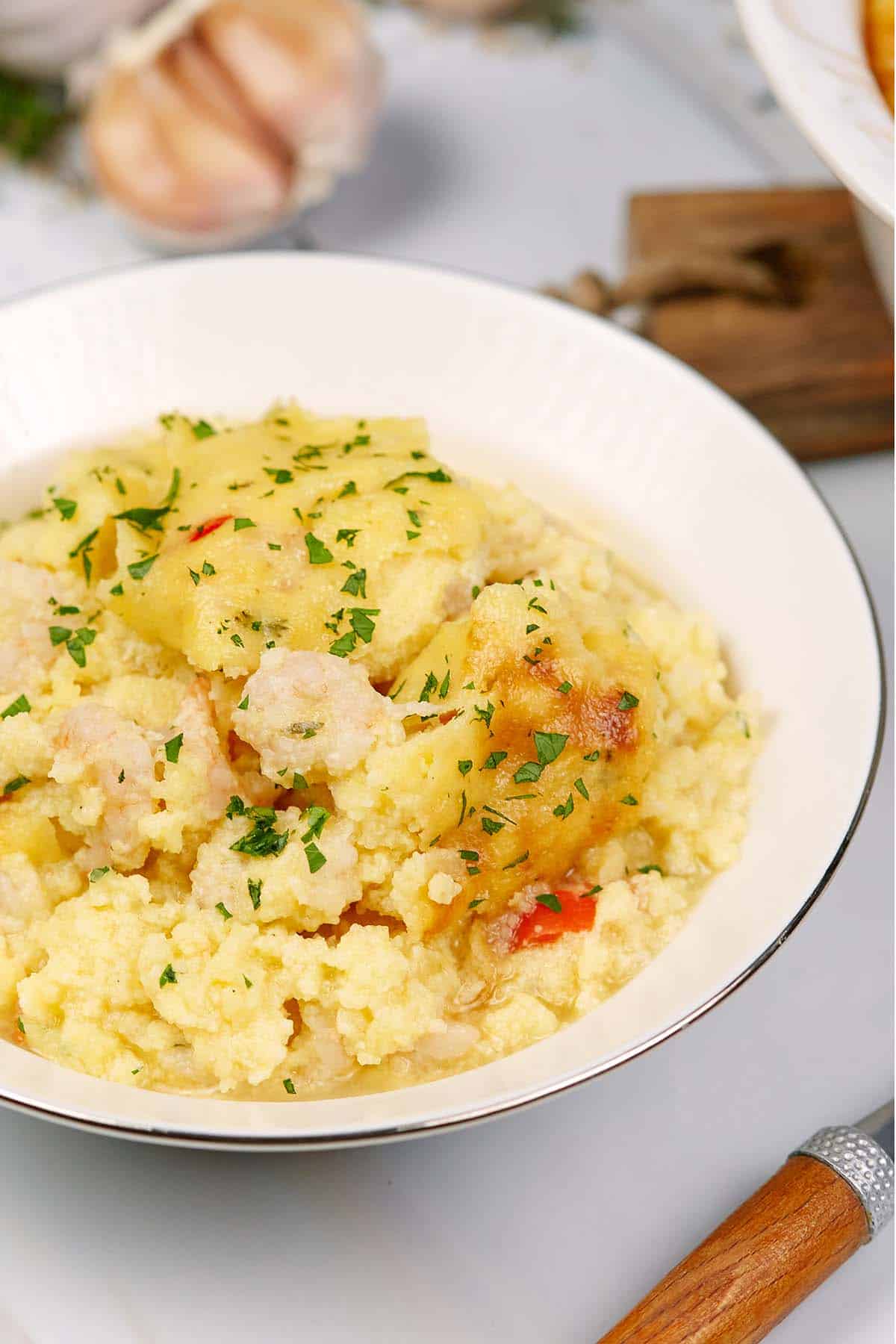 serving of shrimp and grits bake in a bowl ready to enjoy