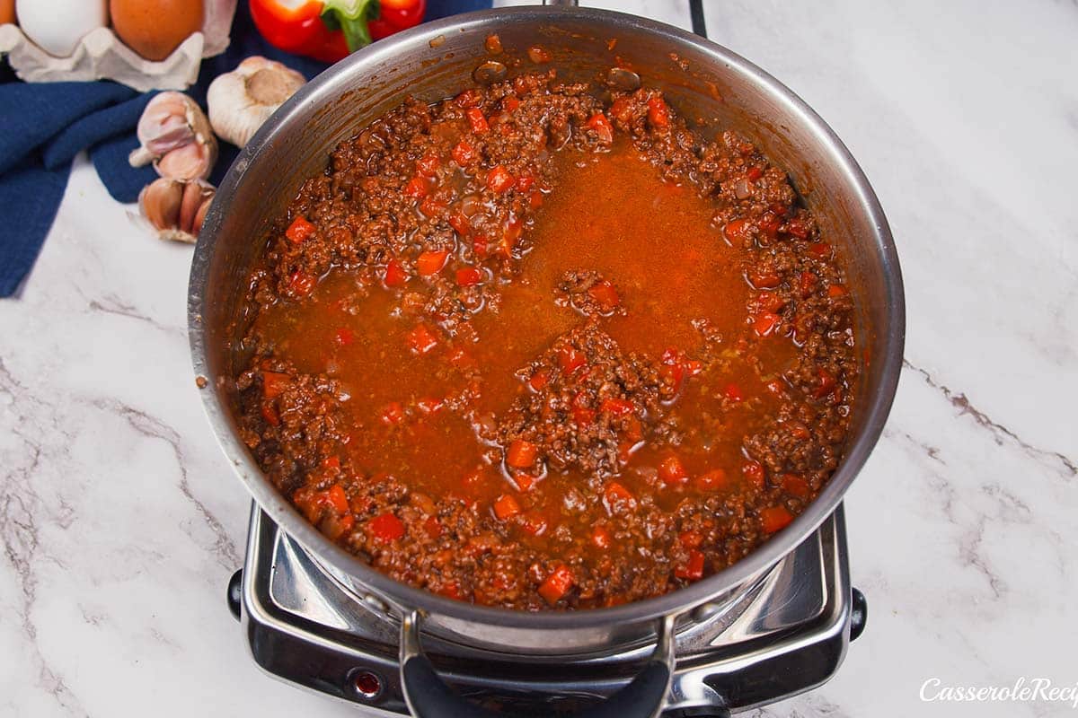 ingredients in a pot to make flaky sloppy joe casserole