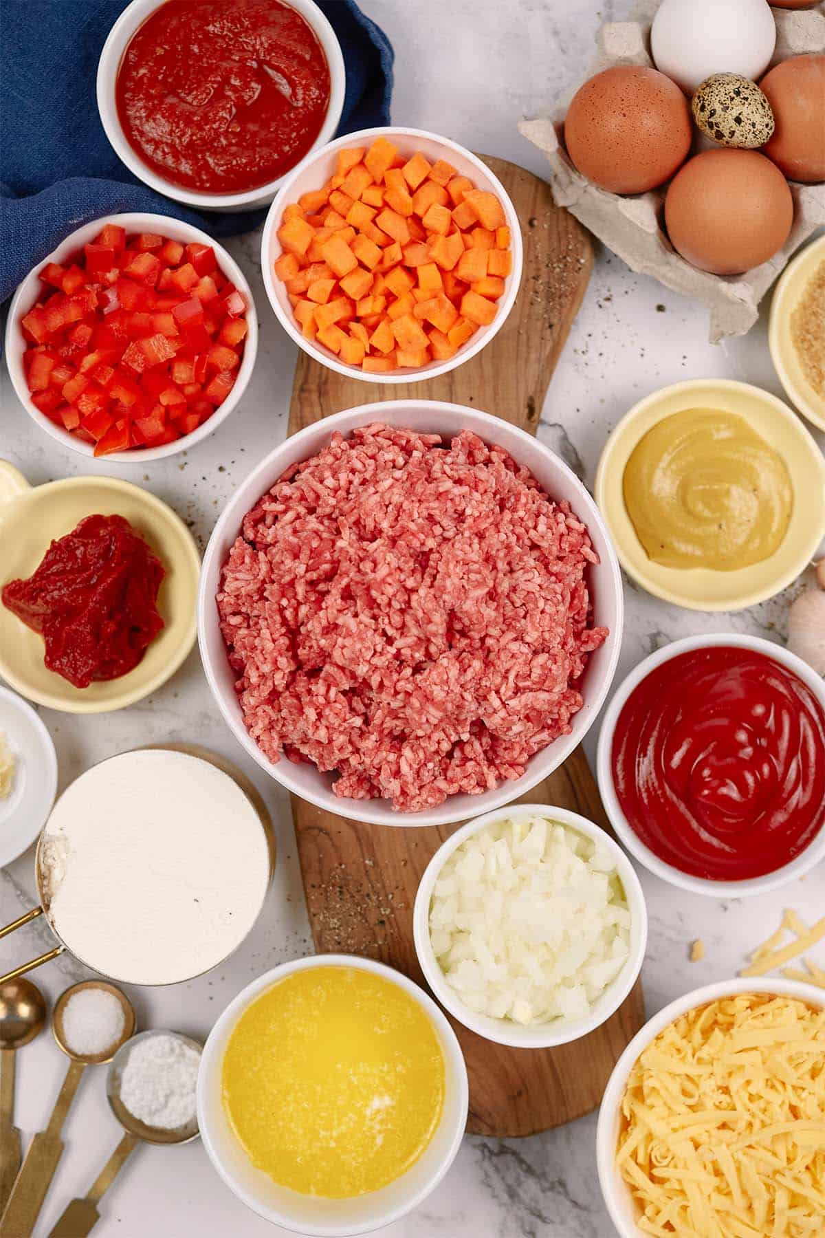 ingredients to make flaky sloppy joe casserole laid out on a table