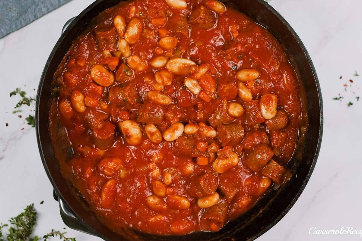 overhead view of final step of vegan sausage casserole prior to baking