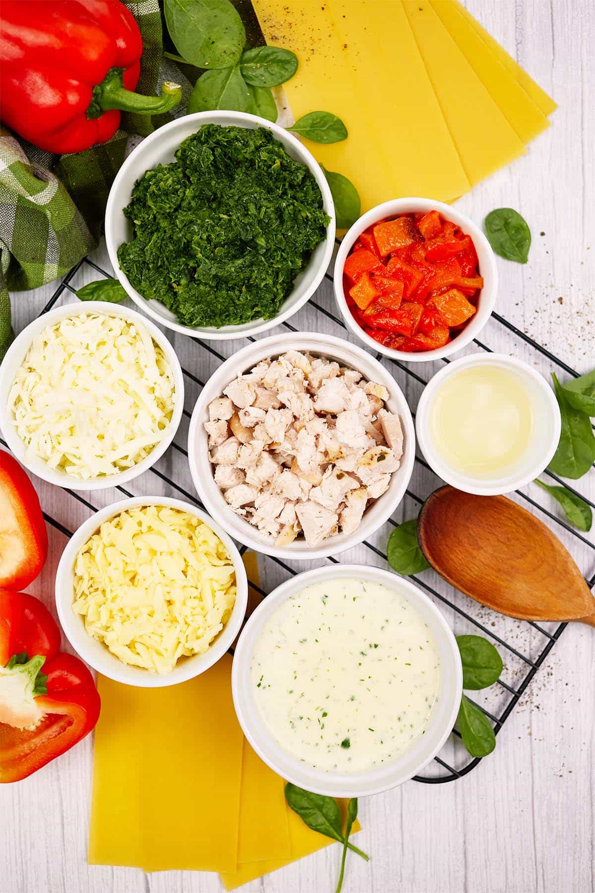 ingredients to make Chicken Caesar Lasagna laid out on a table