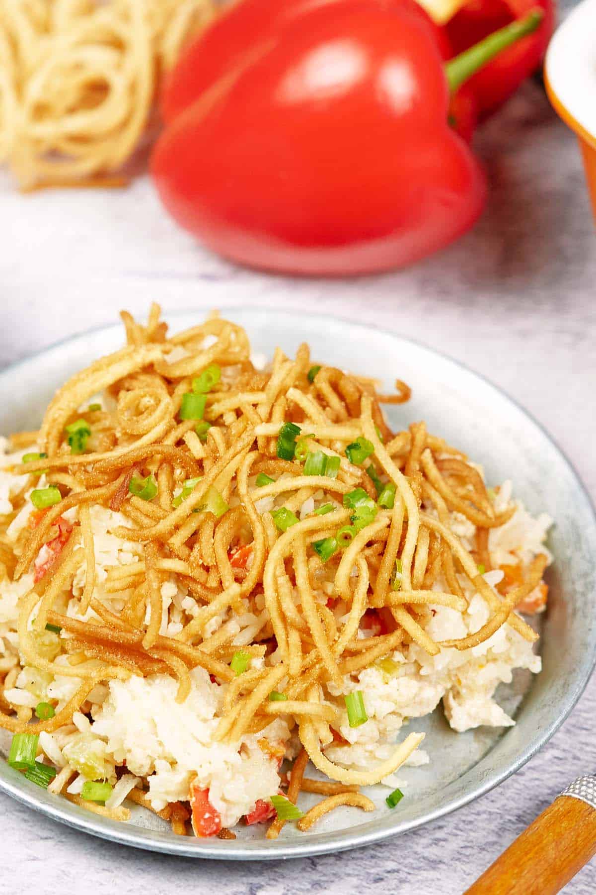 serving of Chicken chow mein casserole on a plate ready to enjoy