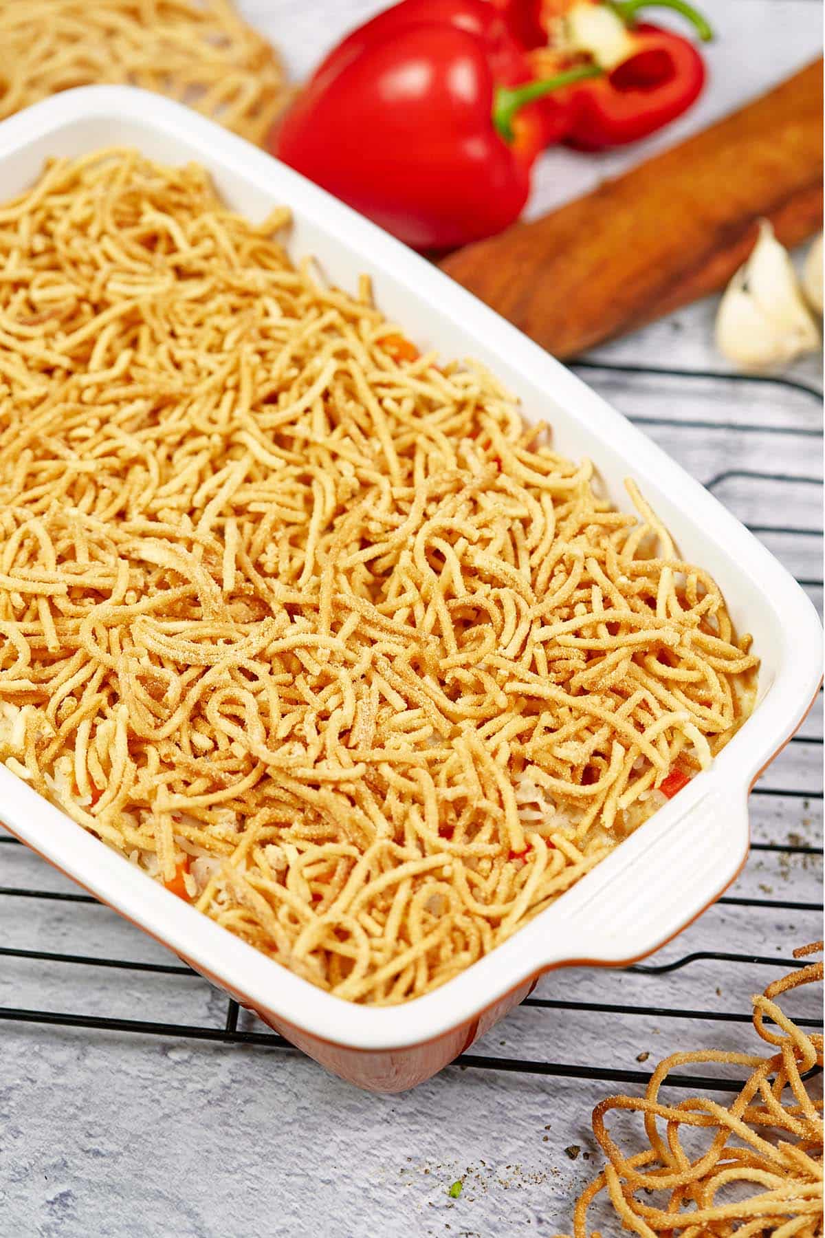 Chicken chow mein casserole in a baking dish on a table