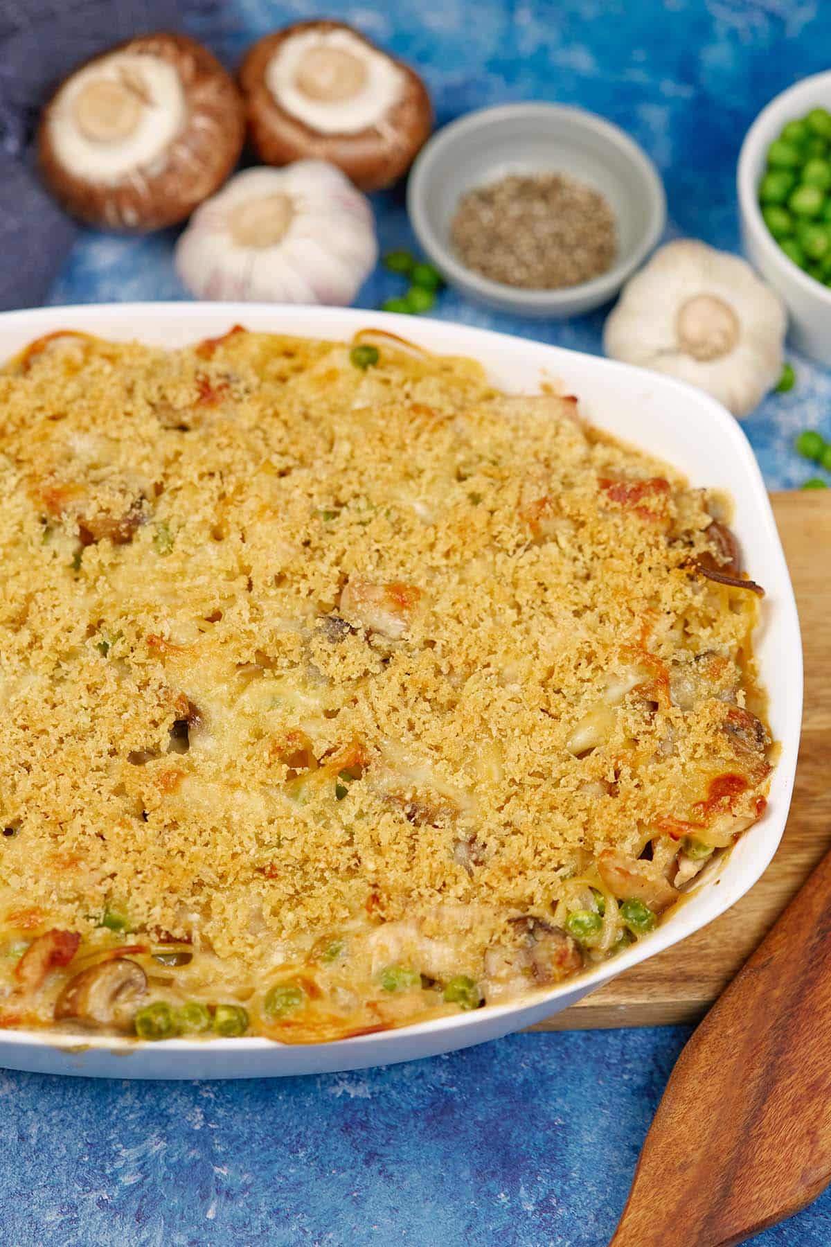 baking dish of Tetrazzini Casserole on a table with extra ingredients
