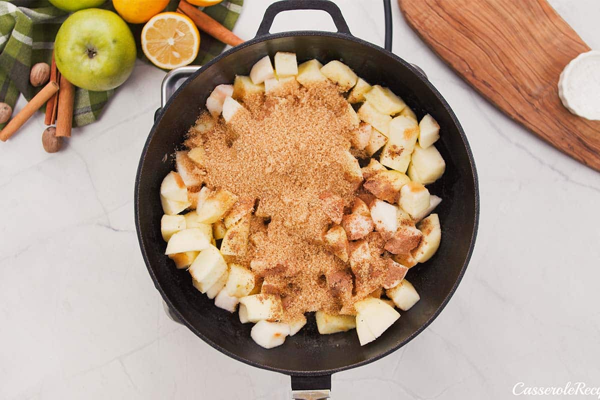 coating apples with spices to make apple pandowdy