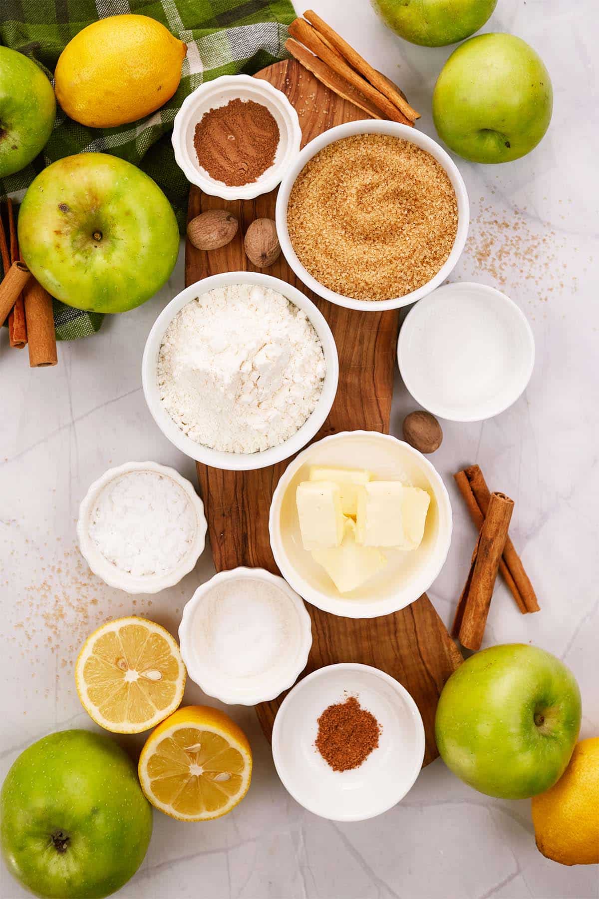 ingredients to make apple pandowdy laid out on a table