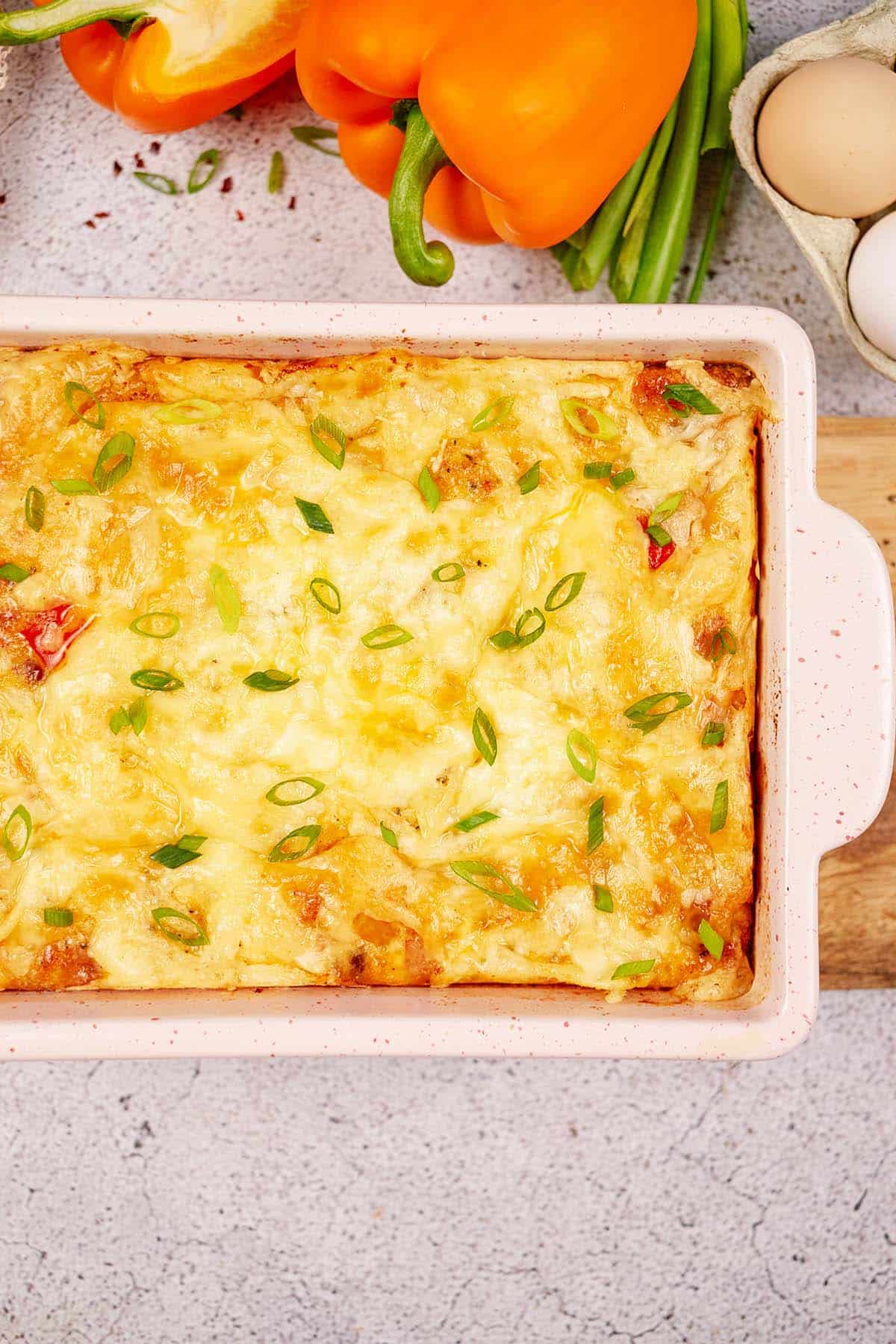 casserole dish of baked denver omelette on a table ready to serve