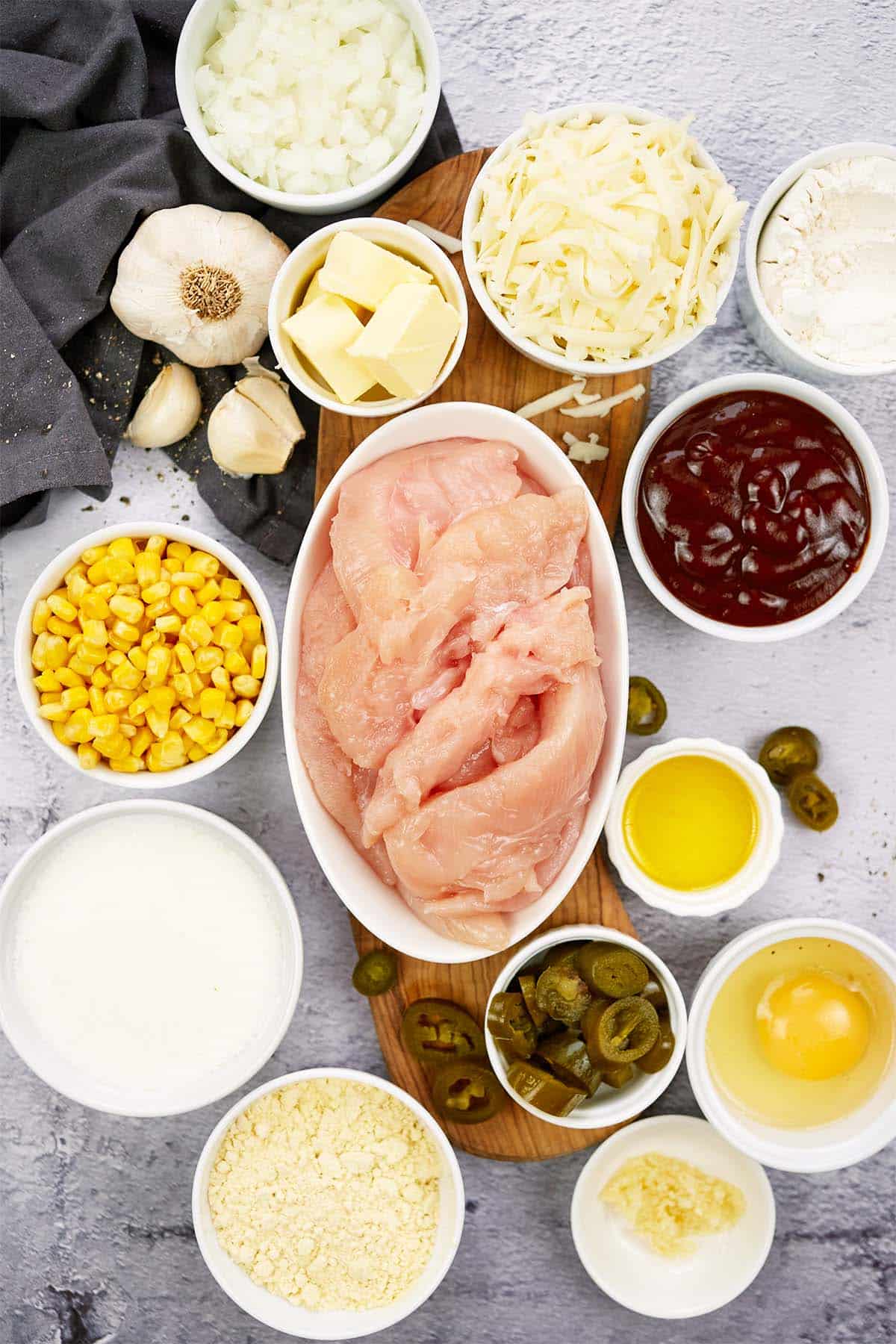 ingredients to make bbq chicken pot pie laid out on a table