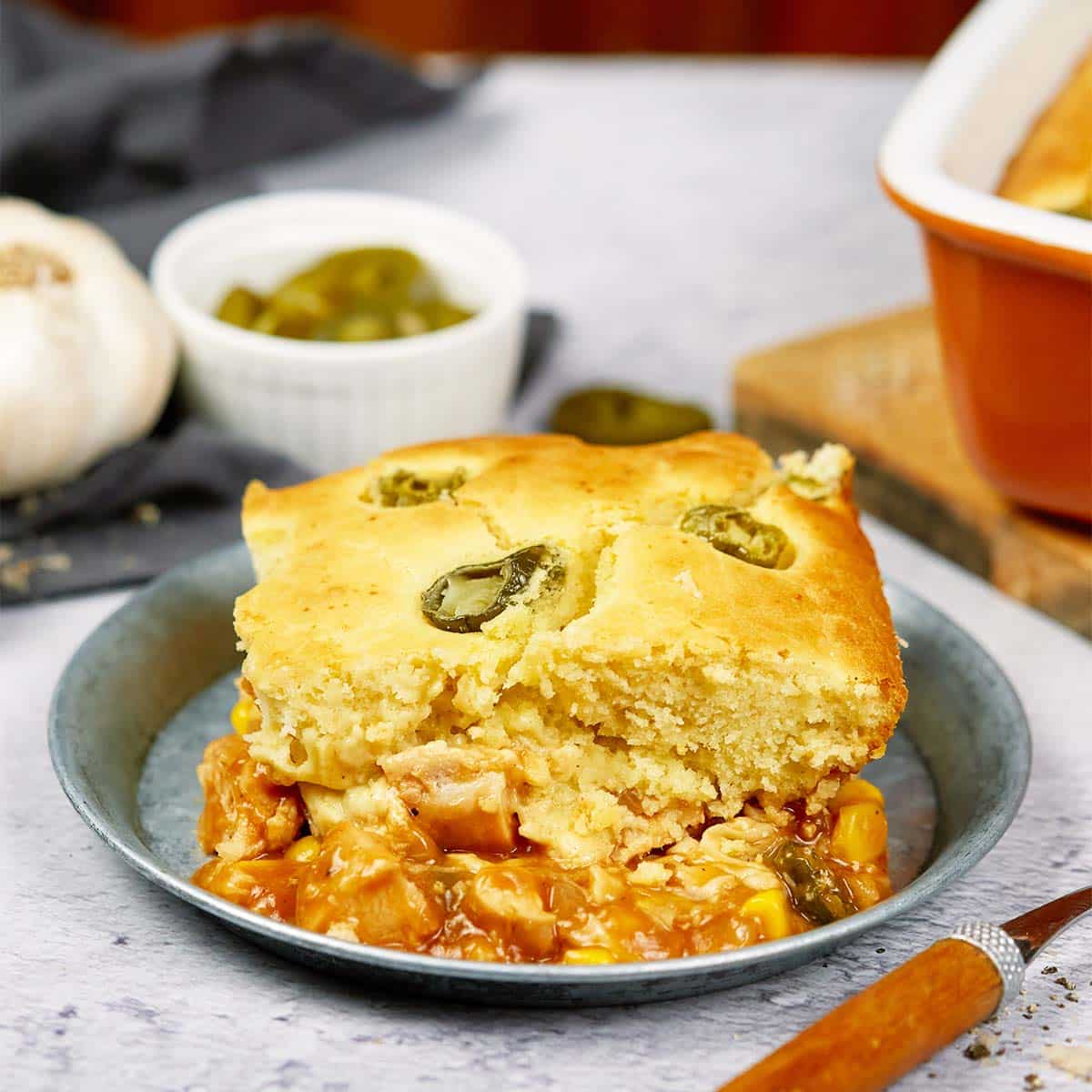 serving of bbq chicken pot pie on a plate ready to enjoy