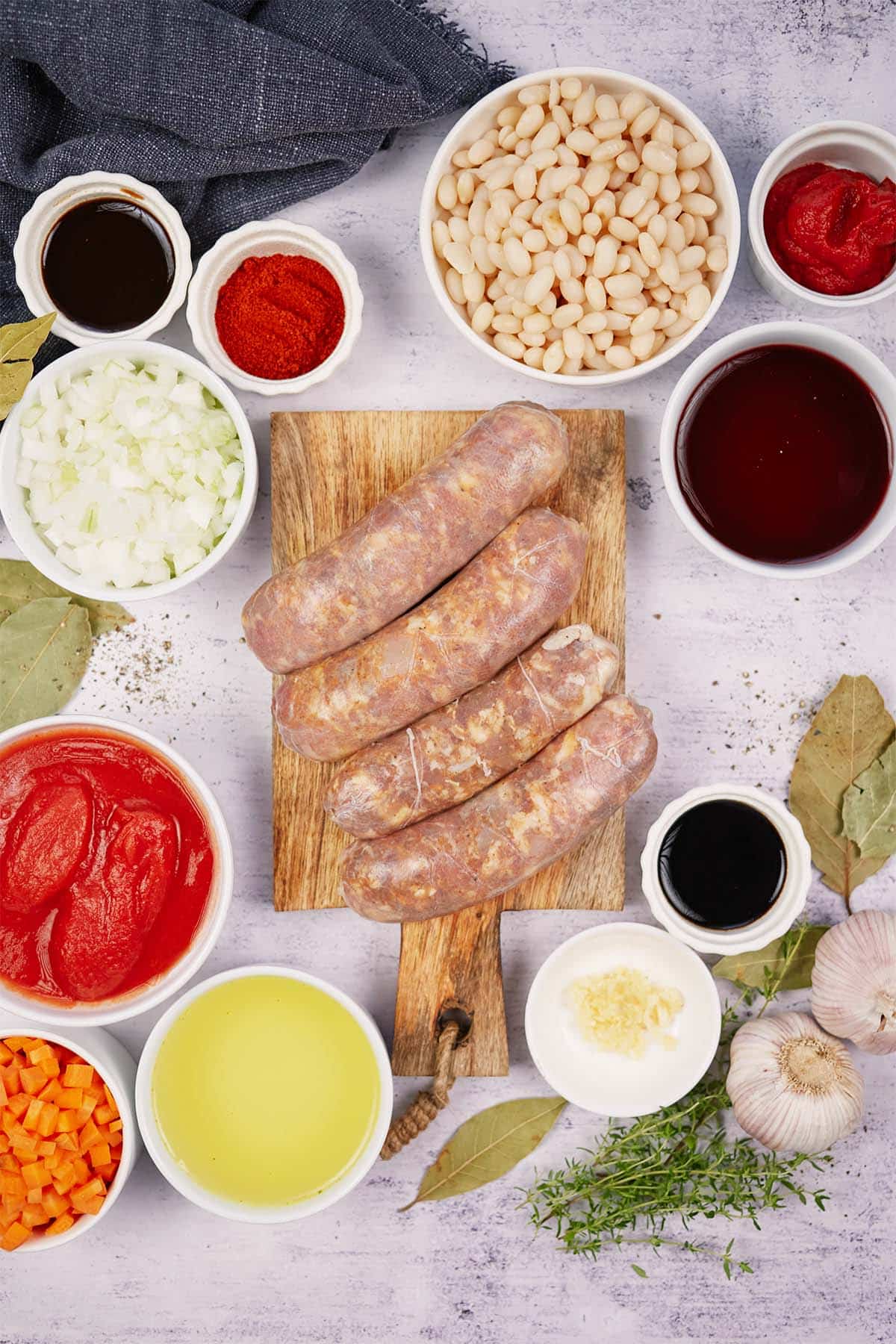 ingredients to make best ever sausage casserole laid out on a table