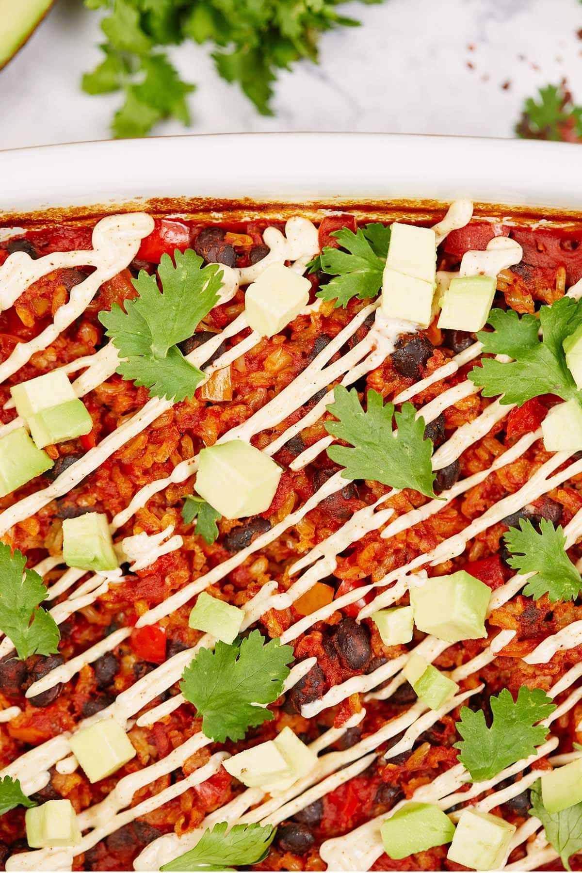 closeup of chipotle black bean dump and bake casserole in a baking dish