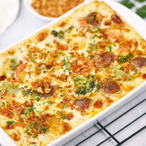 overhead view of a baking dish of creamy meatball casserole ready to serve