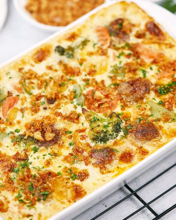 overhead view of a baking dish of creamy meatball casserole ready to serve