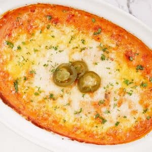 baking dish of hot sausage dip ready to serve