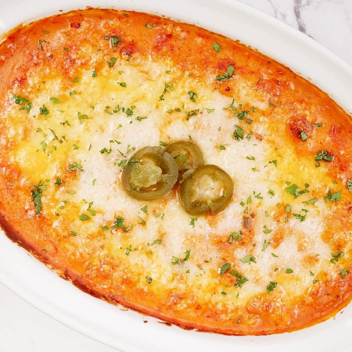 baking dish of hot sausage dip ready to serve