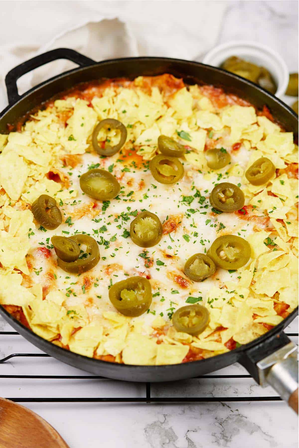 cast iron skillet of king ranch chicken casserole fresh from the oven