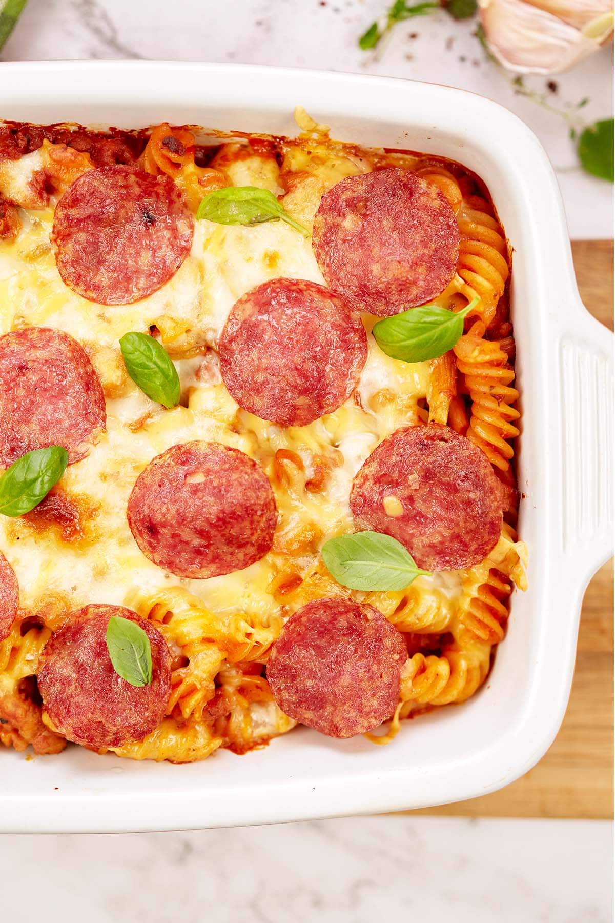 closeup of noodle pizza casserole in a baking dish
