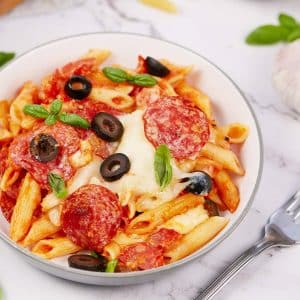 serving of pepperoni pasta bake in a bowl ready to enjoy