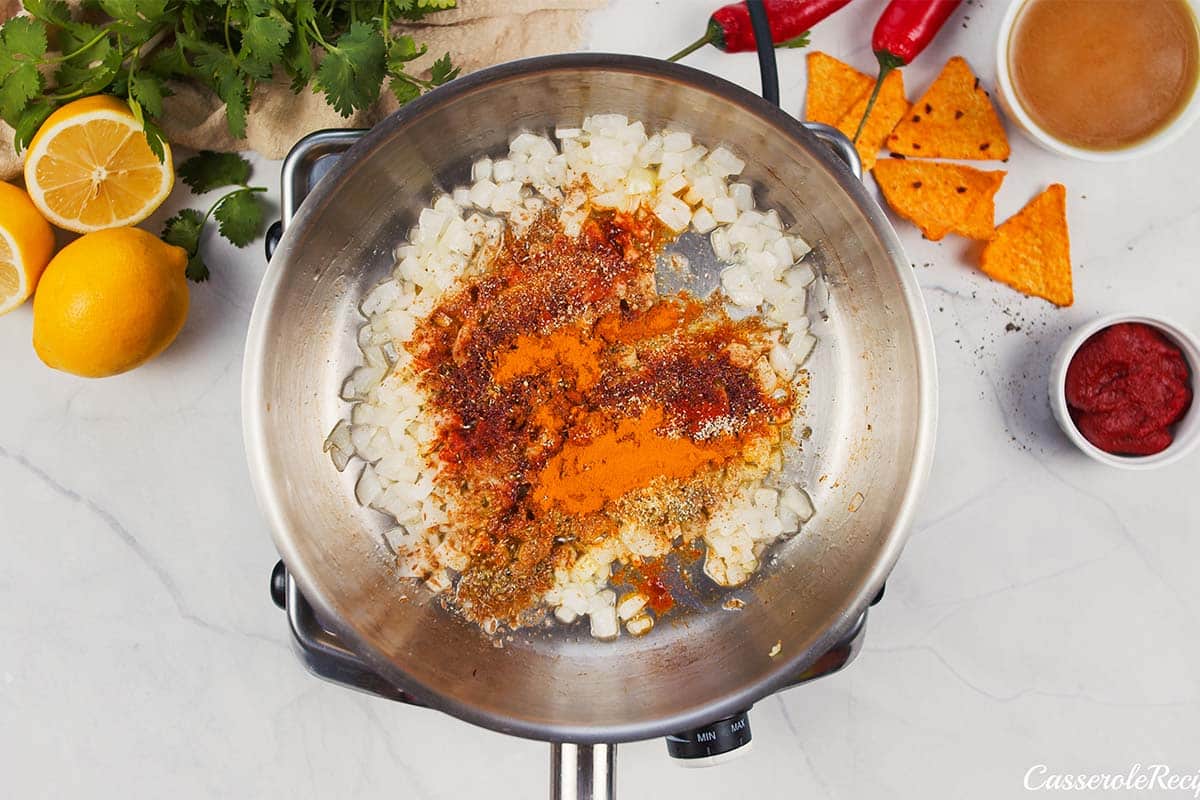 onions and other ingredients being sauteed to make shawarma casserole