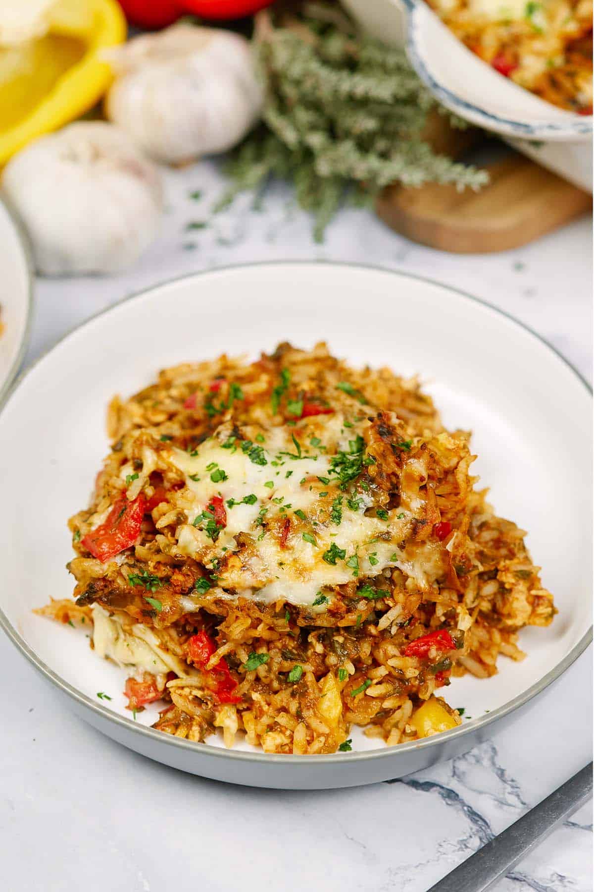single serving of stuffed pepper casserole on a white plate